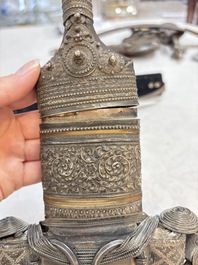 Three Omani Khanjars, one with Rhinoceros horn hilt, 19th C.