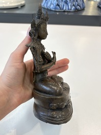 A Sino-Tibetan bronze Bodhisattva, a Thai Buddha and a phurba, 18/19th C.