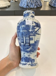 A Chinese blue and white garniture of five vases with landscape design, 19th C.