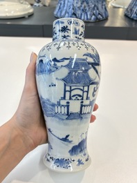 A Chinese blue and white garniture of five vases with landscape design, 19th C.
