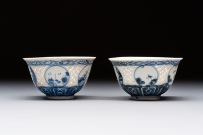 A pair of reticulated Chinese blue and white 'Hatcher Cargo' shipwreck bowls, Transitional period