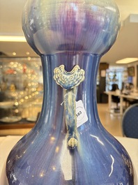 A Chinese flamb&eacute;-glazed garlic-mouth vase with ruyi handles, 19th C.
