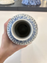 A Chinese blue and white garniture of five vases with landscape design, 19th C.