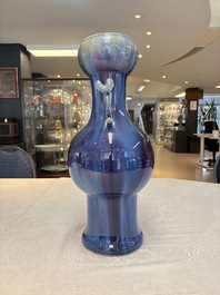A Chinese flamb&eacute;-glazed garlic-mouth vase with ruyi handles, 19th C.