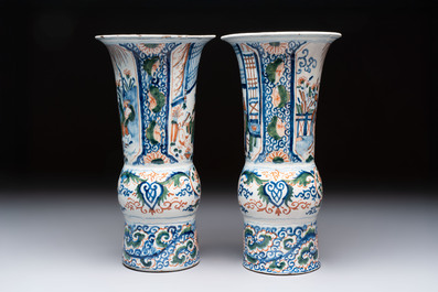 A pair of unusual polychrome Dutch Delft Kangxi-style chinoiserie beaker vases, early 18th C.