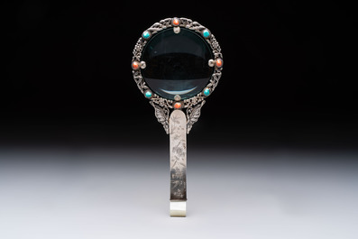 A Chinese silver-mounted magnifying glass with jade handle and precious stone inlays, 19th C.