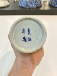 A Chinese blue and white garniture of five vases with landscape design, 19th C.