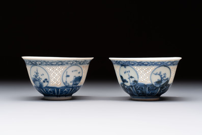 A pair of reticulated Chinese blue and white 'Hatcher Cargo' shipwreck bowls, Transitional period
