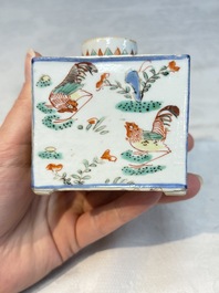 A pair of Chinese famille verte rectangular tea caddies and covers with fighting roosters, Kangxi