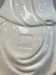A Chinese white-glazed Guanyin, Kangxi mark, 19th C.