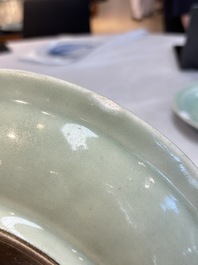 Three Chinese celadon-glazed plates with floral anhua design, 18/19th C.