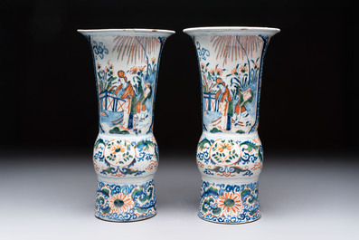 A pair of unusual polychrome Dutch Delft Kangxi-style chinoiserie beaker vases, early 18th C.