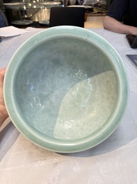 A Chinese celadon-glazed tripod censer with floral anhua design, 18/19th C.