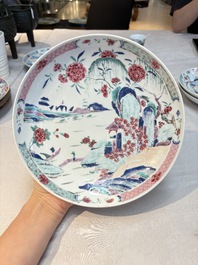 Four Chinese famille rose 'riverscape' plates and five 'flower basket' plates, Qianlong