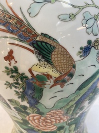 Two Chinese famille verte 'birds and flowers' vases and covers, 19th C.