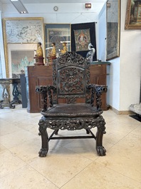 A pair of Chinese finely carved hongmu armchairs, Canton, 19th C.