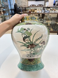 A pair of Chinese verte-biscuit 'cranes and flowers' vases and covers, 19th C.