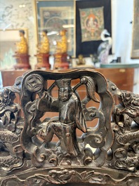 A pair of Chinese finely carved hongmu armchairs, Canton, 19th C.