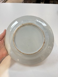 A set of 12 Chinese famille rose plates with squirrels among grapes and peonies, Qianlong
