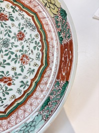 A Chinese wucai dish with floral design, Kangxi mark and of the period