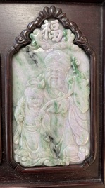 Four Chinese lavender and green jadeite 'Fu Lu Shou Quan 福祿壽全' plaques mounted in a hongmu frame, 19th/20th C.