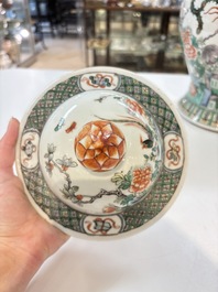 A Chinese famille verte 'phoenixes' vase and cover, 19th C.