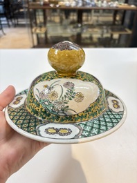 A pair of Chinese verte-biscuit 'cranes and flowers' vases and covers, 19th C.