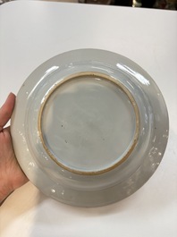 A set of 12 Chinese famille rose plates with squirrels among grapes and peonies, Qianlong