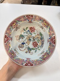 A set of 12 Chinese famille rose plates with squirrels among grapes and peonies, Qianlong