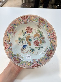 A set of 12 Chinese famille rose plates with squirrels among grapes and peonies, Qianlong