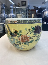 A Chinese famille rose yellow-ground 'pheasant and peony' scroll pot, 19th C.
