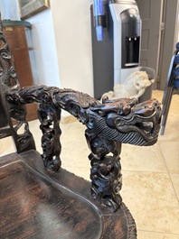 A pair of Chinese finely carved hongmu armchairs, Canton, 19th C.