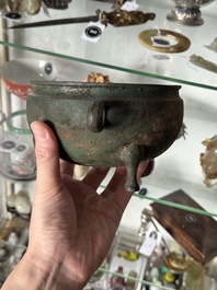 A Chinese archaic bronze tripod food vessel, 'dun 敦', Eastern Zhou
