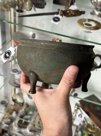 A Chinese archaic bronze tripod food vessel, 'dun 敦', Eastern Zhou