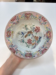 A set of 12 Chinese famille rose plates with squirrels among grapes and peonies, Qianlong