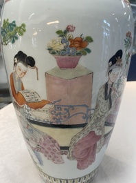 A pair of Chinese famille rose vases with court ladies, 19/20th C.