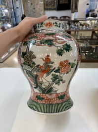 Two Chinese famille verte 'flowers and mythical animals' vases, 19th C.