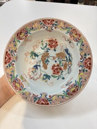 A set of 12 Chinese famille rose plates with squirrels among grapes and peonies, Qianlong