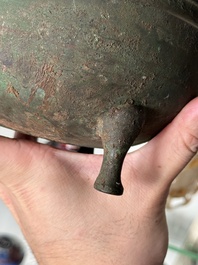 A Chinese archaic bronze tripod food vessel, 'dun 敦', Eastern Zhou