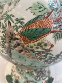 Two Chinese famille verte 'birds and flowers' vases and covers, 19th C.