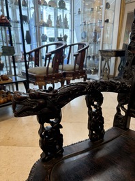 A pair of Chinese finely carved hongmu armchairs, Canton, 19th C.