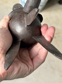 A Chinese archaic bronze wine vessel with taotie design, 'jue 爵', Zhou