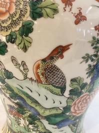 Two Chinese famille verte 'birds and flowers' vases and covers, 19th C.