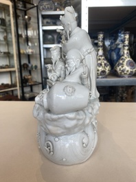 A Chinese Dehua blanc de Chine group of four deities on a boat, Republic