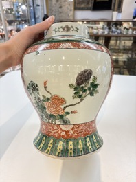 Two Chinese famille verte 'flowers and mythical animals' vases, 19th C.
