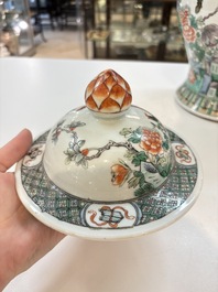 A Chinese famille verte 'phoenixes' vase and cover, 19th C.