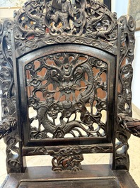 A pair of Chinese finely carved hongmu armchairs, Canton, 19th C.