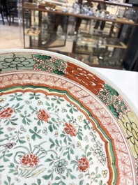 A Chinese wucai dish with floral design, Kangxi mark and of the period