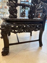 A pair of Chinese finely carved hongmu armchairs, Canton, 19th C.