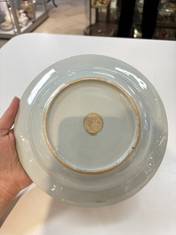 A set of 12 Chinese famille rose plates with squirrels among grapes and peonies, Qianlong